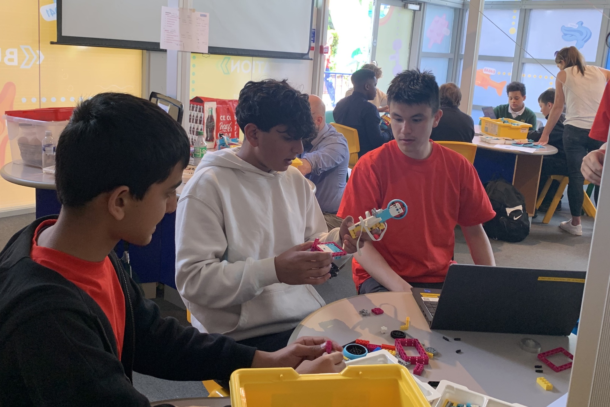 Robotics team coding their robot